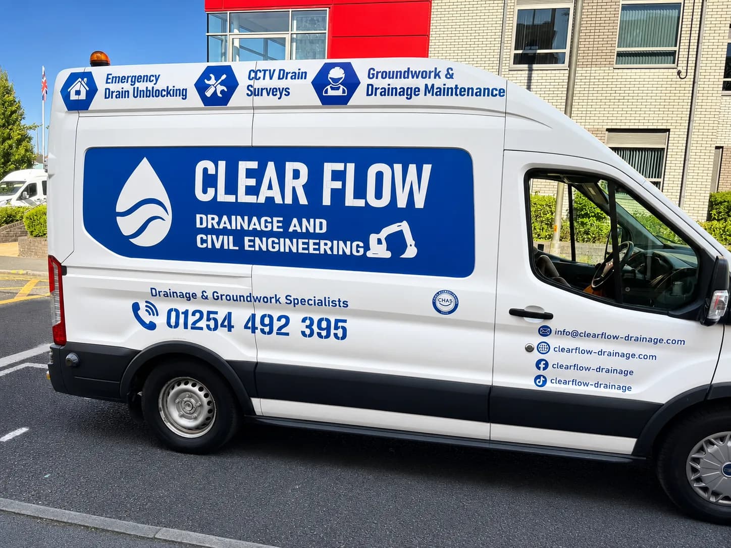 Clear Flow Drainage team and vehicles on site in Lancashire
